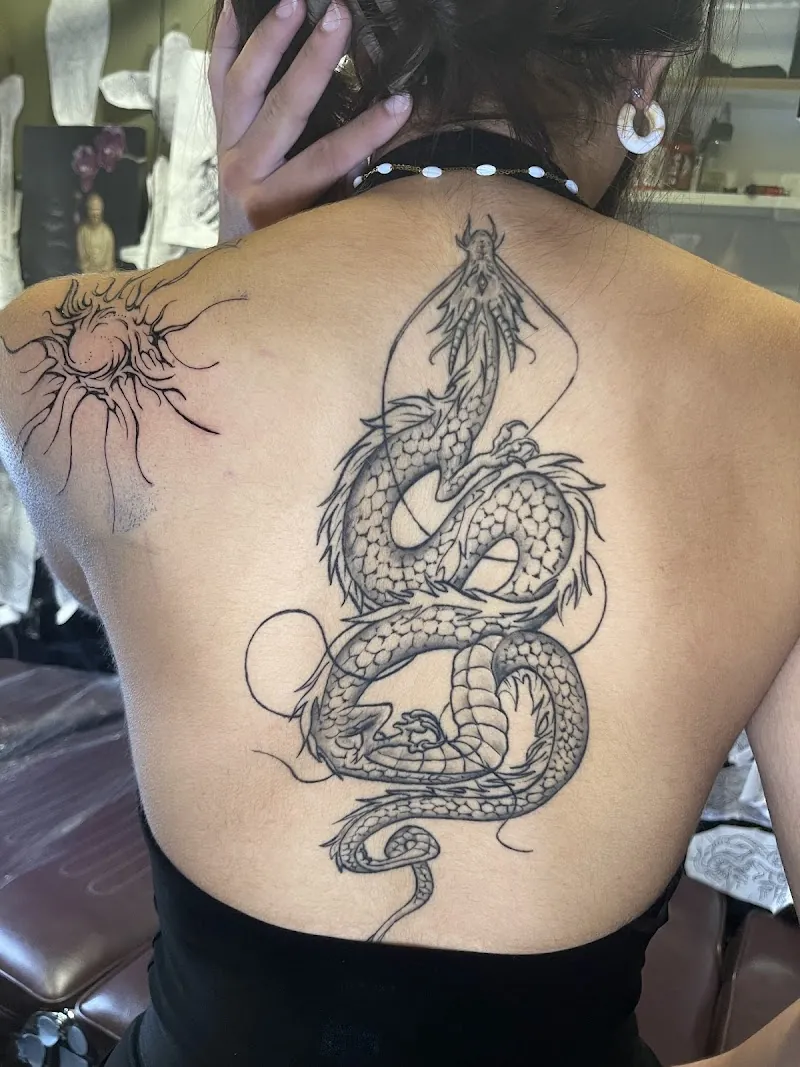 Madin Ink Tattoo