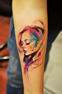 Tatouage aquarelle portrait réaliste