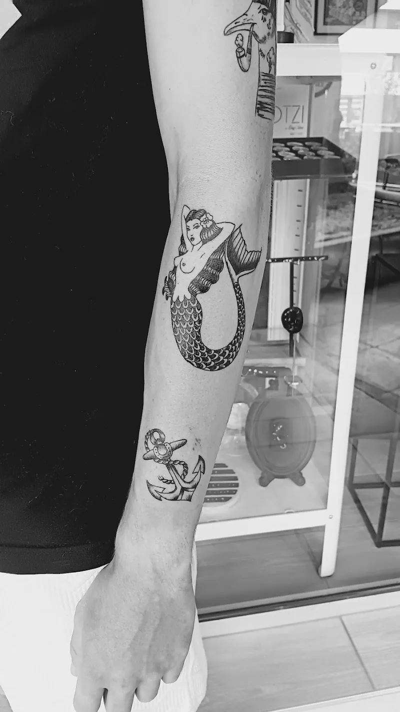 Galerie de tatouages 54 Twenty-Six-Needles
