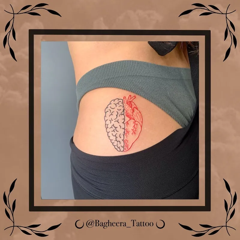 Galerie de tatouages 91 Bagheera Tattoo