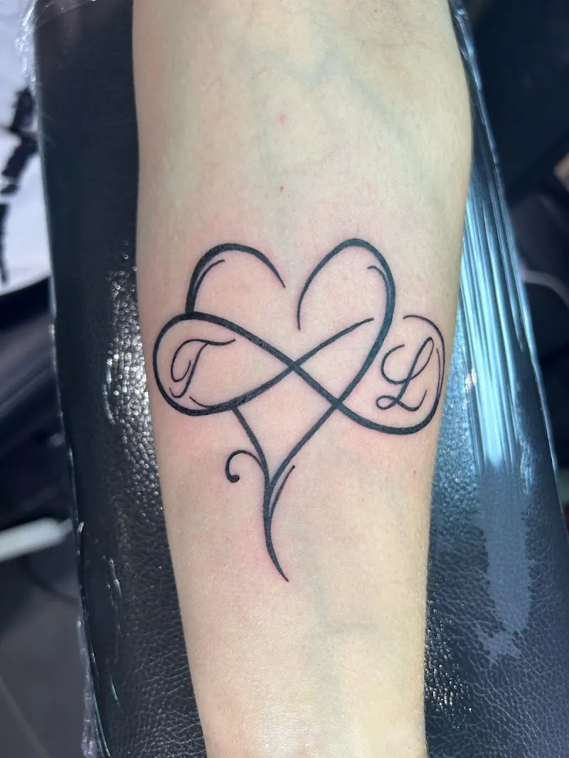 Galerie de tatouages 9 Cœur Riflon