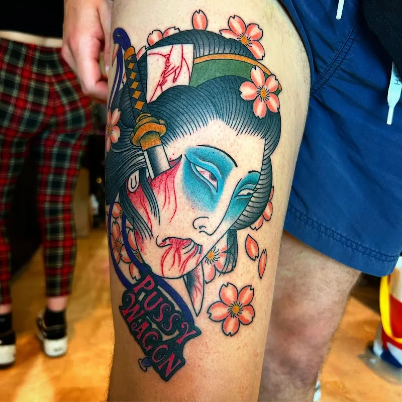 Galerie de tatouages 53 La 11E Porte