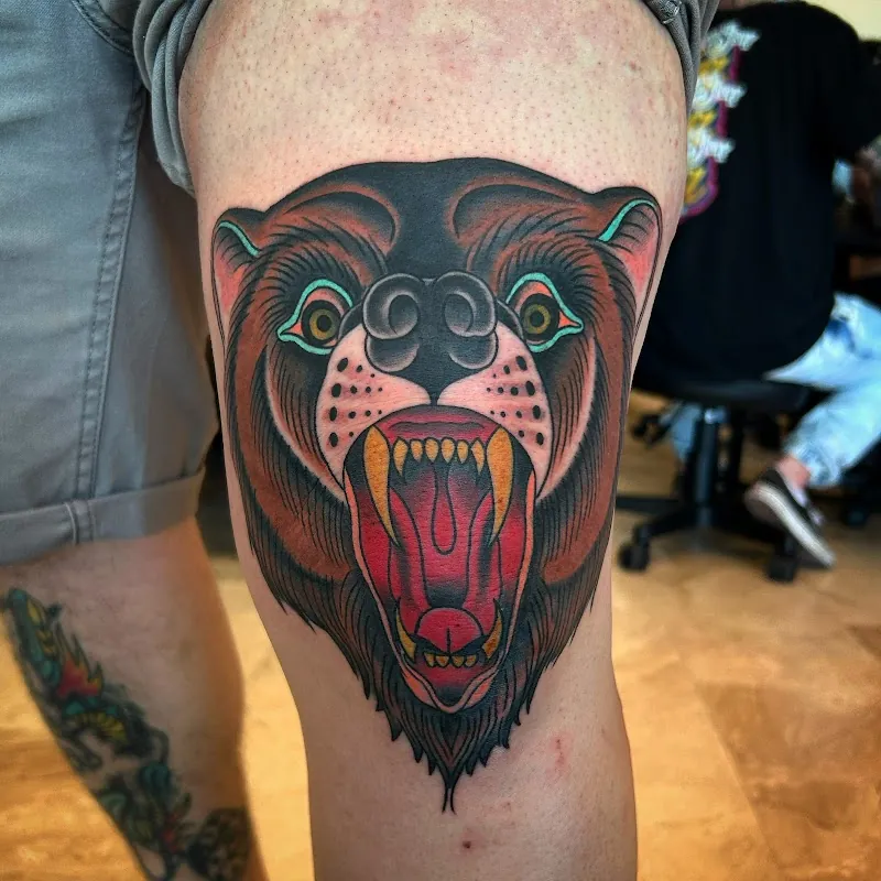 Galerie de tatouages 56 La 11E Porte
