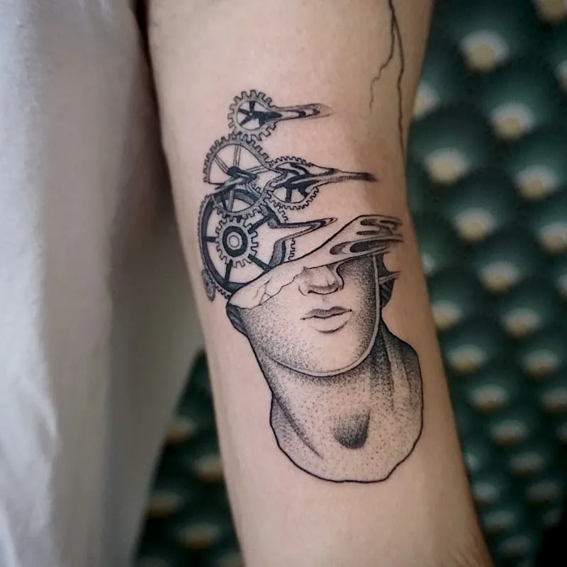 Galerie de tatouages 55 La 11E Porte