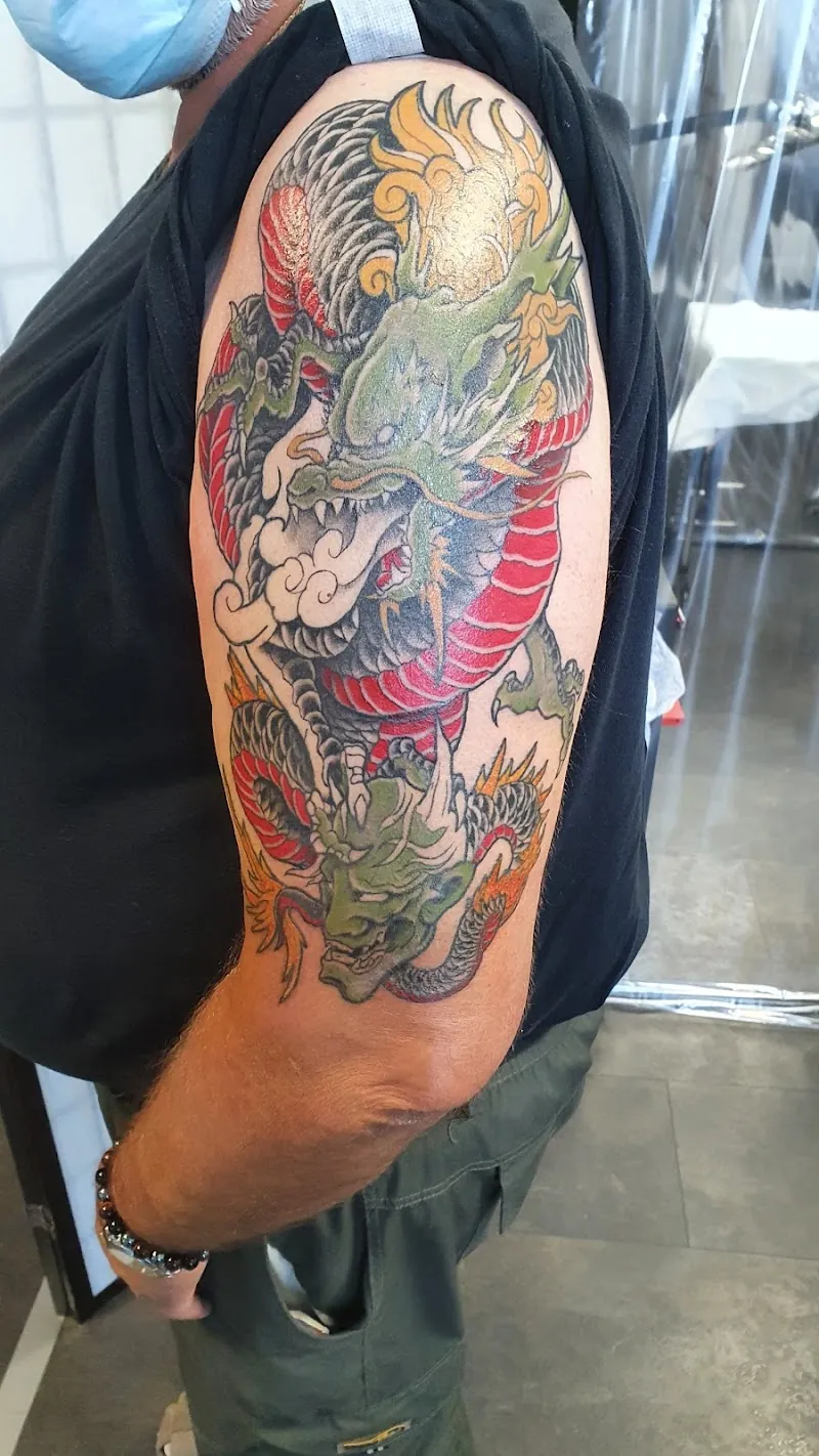 Galerie de tatouages 50 Monsieur No Tattoo