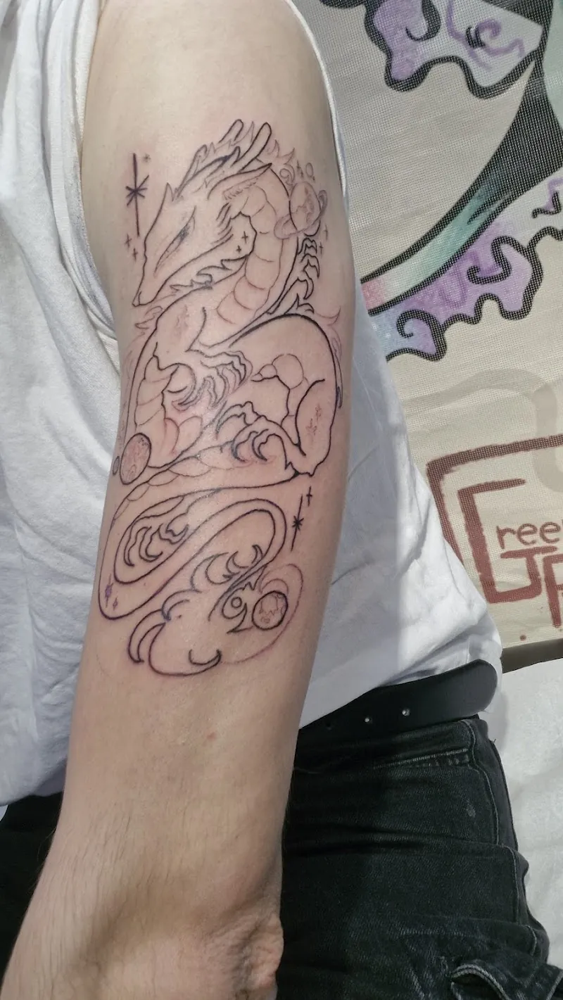 Galerie de tatouages 9 Noir Carbone